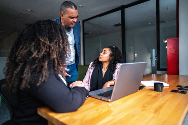 istock CEO/Manager arguing/talking with employees at office 1520210892
