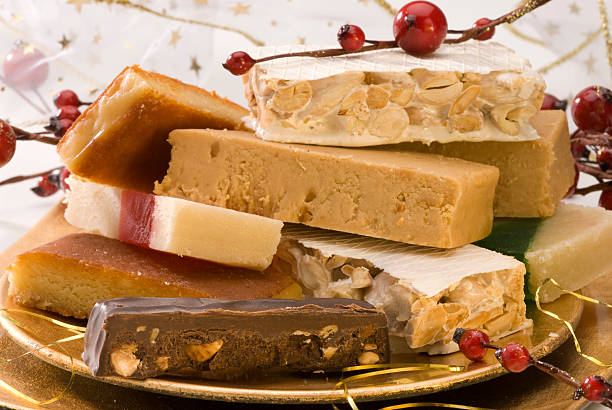 ассортимент испанских нуга - torrone стоковые фото и изображения