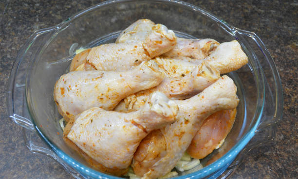 istock chicken deer marinated in tomato with spices laid out in a glass baking dish 1520226298
