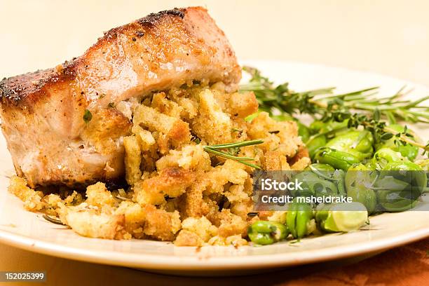 A Plate With Stuffed Pork Chop On A White Plate Stock Photo - Download Image Now - Stuffed, Meat Chop, Pork