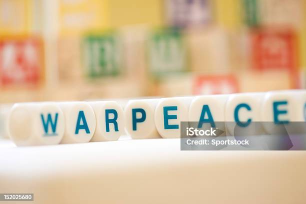 War And Peace Spelled With Scrabble Tiles Stock Photo - Download Image Now - Single Word, Child, Cube Shape