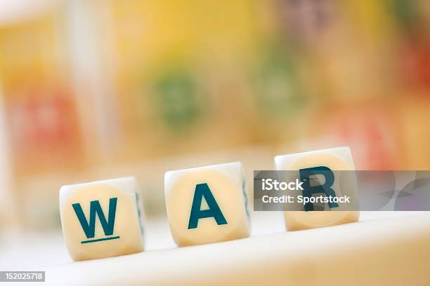Word War Spelled With Scrabble Tiles Stock Photo - Download Image Now - Alphabet, Block Shape, Capital Letter