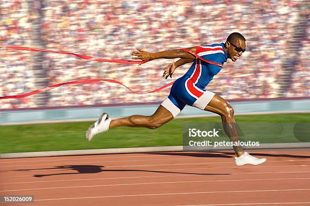 Sprinter Crossing The Finish Line Stock Photo - Download Image Now - Running, Finish Line, Winning