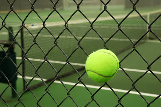 Caught tennis ball stock photo