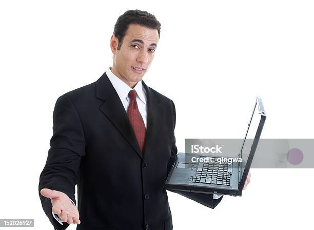 Foto de Empresário Balançando Um Bastão Segurando Laptop Isolado No Fundo Branco e mais fotos de stock de 40-44 anos