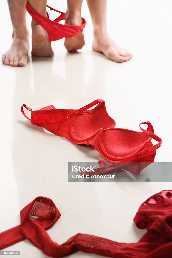 Casal tendo relações sexuais com vermelho Roupa interior no Chão - Royalty-free Casal Foto de stock