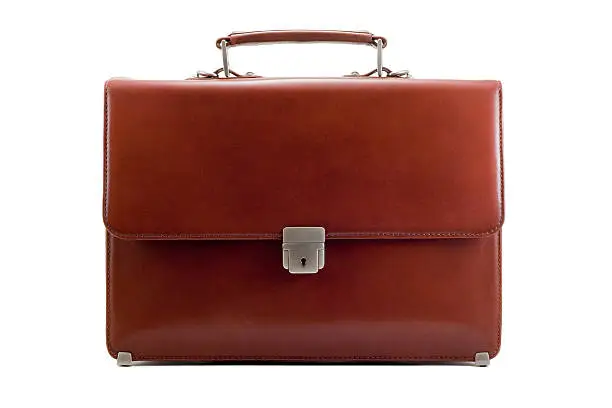 Luxury business brown brief-case on a pure white background