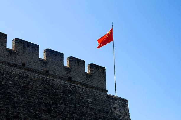 istock ancient city walls and national flag 152027781