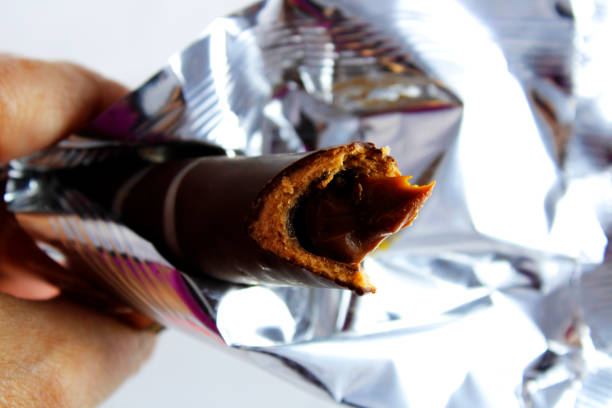 Cuchufli, waffle filled with caramel and covered in chocolate