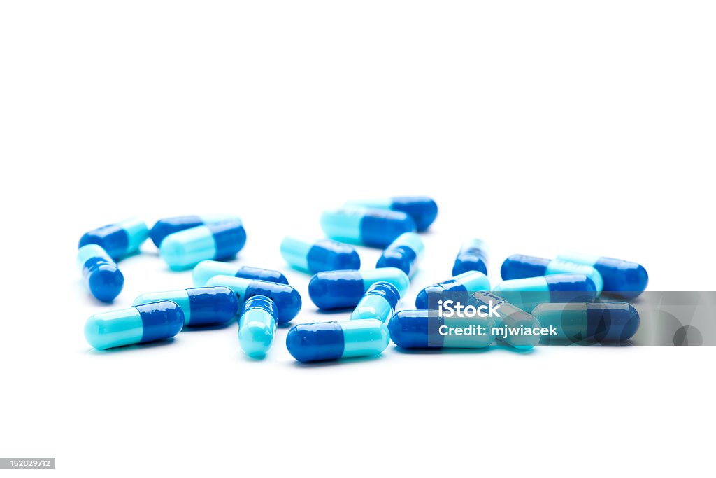 Sombre et bleu clair Gelcaps - Photo de Médicament anticancéreux libre de droits