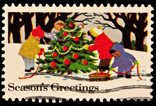 istock Kids Decorating Christmas tree  Season's Greetings Issue 152030018