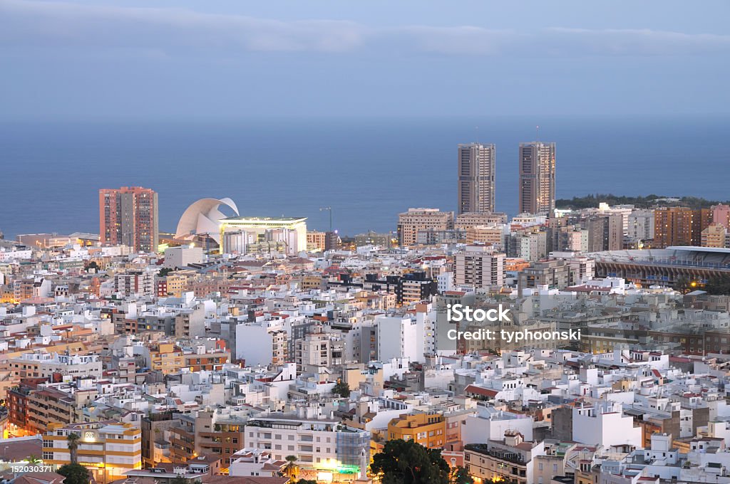 Aerial view of Santa Cruz looking to the ocean Santa Cruz de Tenerife at dusk. Canary Islands, Spain Santa Cruz De Tenerife City Stock Photo