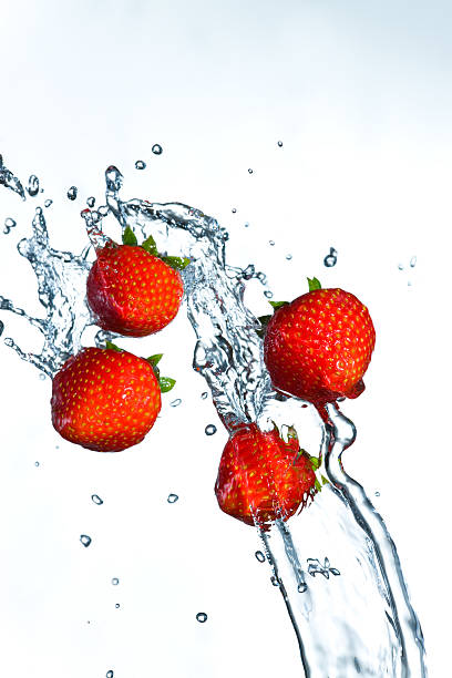 Strawberry in the water stock photo