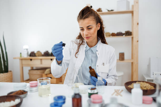 istock Woman performing professional cosmetics research 1520320011