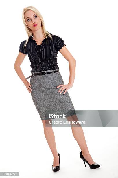 Attractive Businesswoman In Confrontational Stance Stock Photo - Download Image Now - Arms Akimbo, Beautiful People, Beauty
