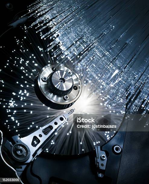 Closeup Of A Computer Hard Disk Exploding In Optic Fibers Stock Photo - Download Image Now