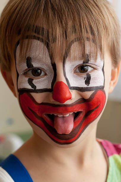 istock Funny young boy painted as clown 152035620