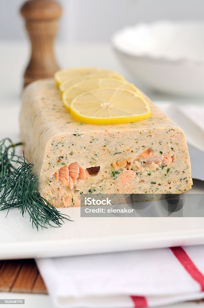 Fresh and smoked salmon terrine Fresh and smoked salmon terrine garnish whith lemon Salmon - Seafood Stock Photo