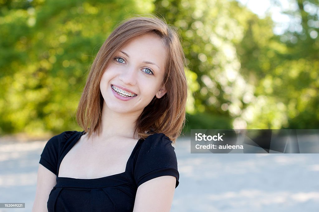 Beautiful girl wearing braces, candid portrait Dental Braces Stock Photo