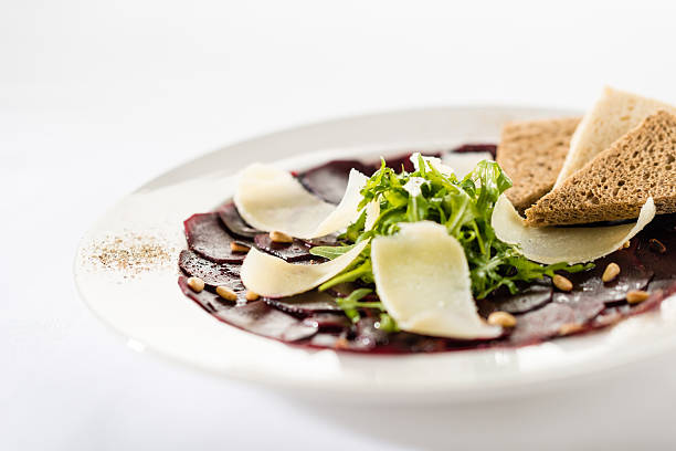Vegetarian carpaccio with beetroot,nuts and toast stock photo