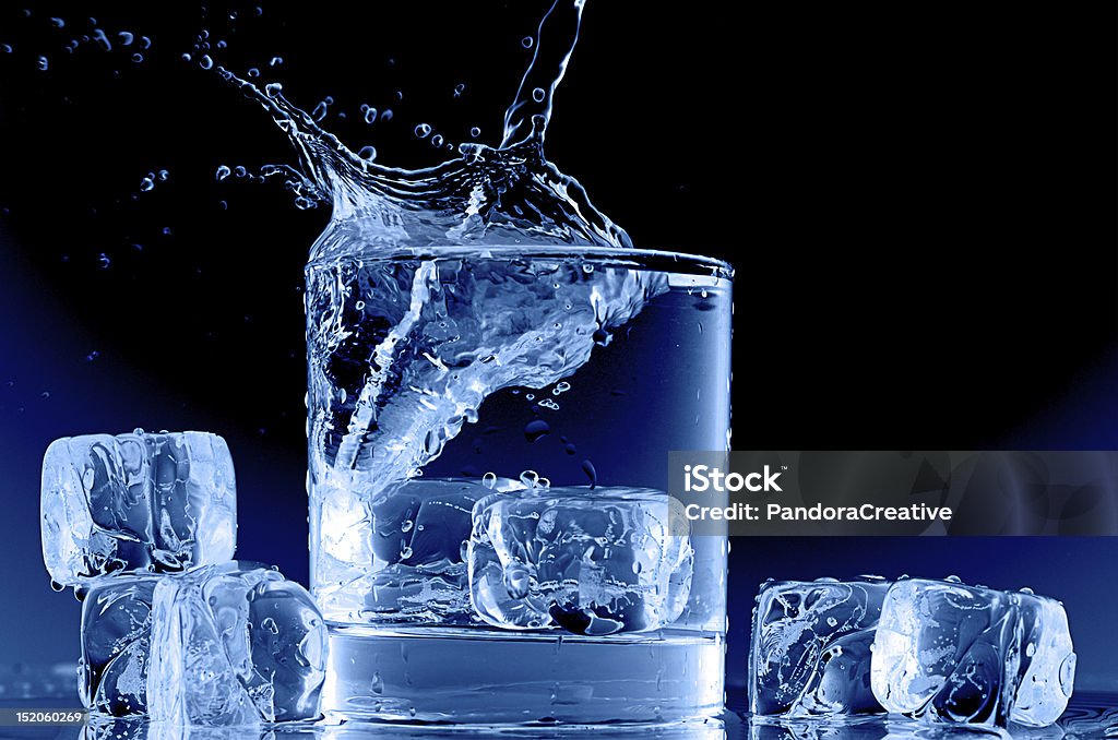 Ice Cold Drink Splash Cold Drink splash with Ice cubes Cold Drink Stock Photo