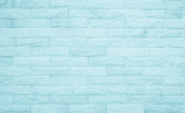 détail de la photo de fond moderne du mur de briques bleues. fond de texture de mur en brique claire bleue pour bloc de carreaux de pierre peint en papier peint blanc de couleur claire design intérieur et extérieur moderne. - block blue brick building activity photos et images de collection