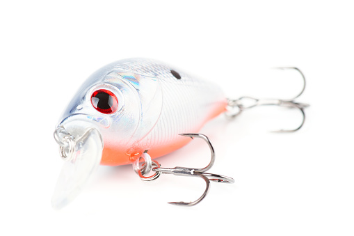 Plastic fishing lure - silver-blue rattler crank bait - isolated on white background