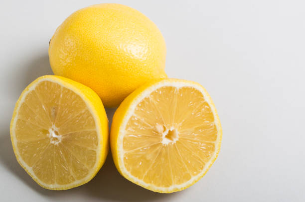 istock Group of ripe lemons on the light background 1520627538