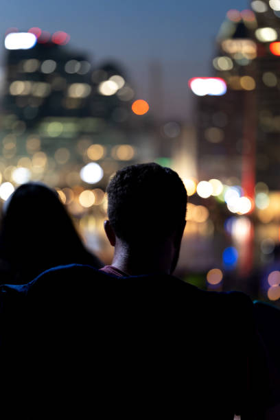 istock Man waiting for 4th of July Fireworks 1520687300