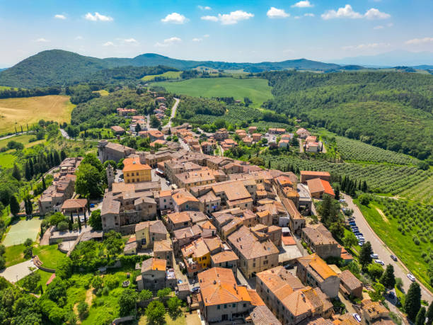 istock Trequanda, Tuscan town from drone 1520713716