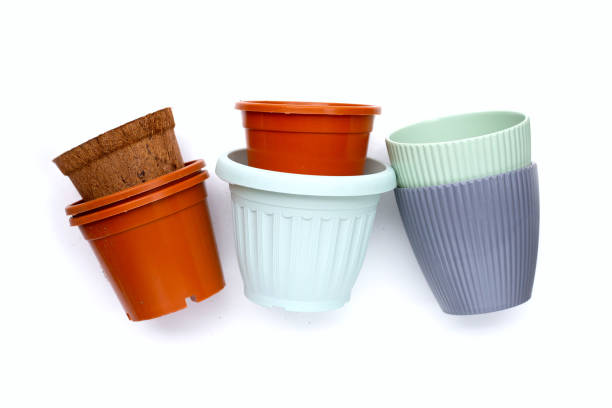 istock Plastic plant pots, containers on white background. 1520754379