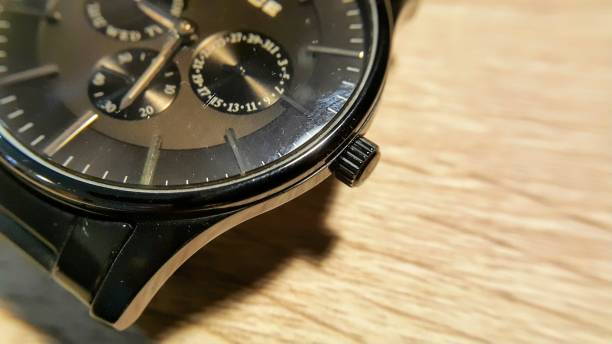 istock Close up view of a black watch on the table. Macro. 1520779890