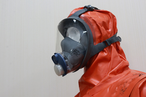 Gas Mask on a red  fabric.