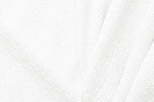 Light tissue from flax fiber. Fabric texture background. White cloth rag