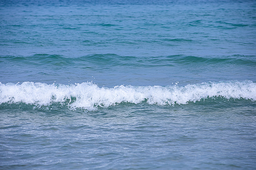 Ideal wave with transparent water in Atlantic ocean. Glassy turquoise wave sunny day