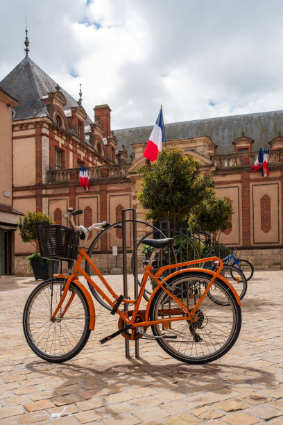 Orange Bicycle with French Flag stock photo
