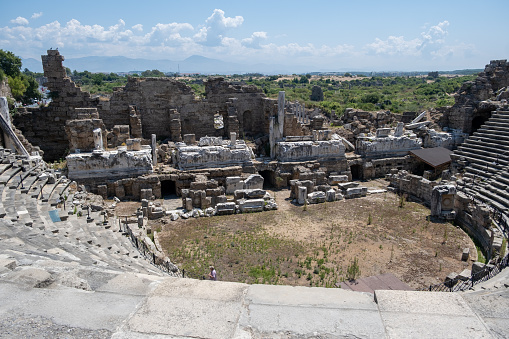 Side Ancient theatre. Turkey. Antalya. Ruins of the ancient city of Side. The largest amphitheater in Turkey. Main street of the ancient city. Mediterranean Sea.