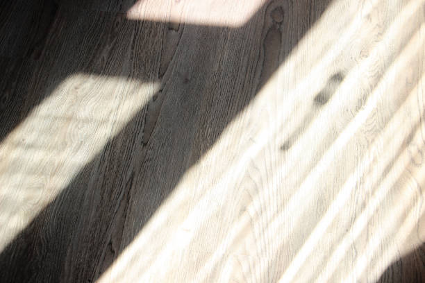 istock Wooden floor with sunlight on it 1521030840