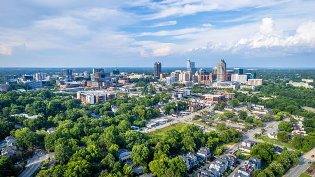 Downtown Raleigh, North Carolina View of downtown Raleigh, North Carolina with blue sky background. dyrham stock pictures, royalty-free photos & images