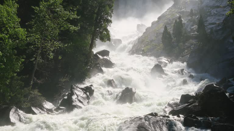 Vernal Falls with powerful flowing water from rushing river and flooding in Yosemite National Park