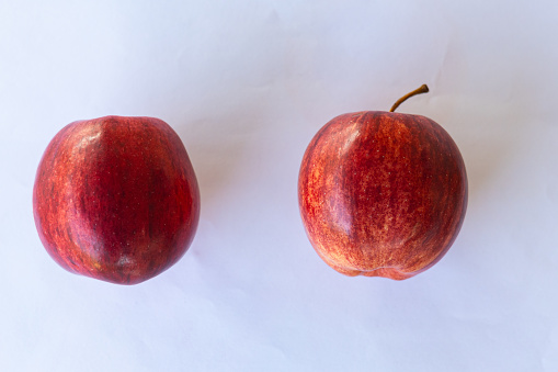 Two apples on a white background
