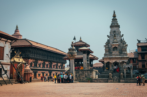 Bhaktapur, Nepal - Apr 16, 2023: A landscape around Bhaktapur Durbar Square, a former royal palace complex and UNESCO World Heritage located in Bhaktapur, Nepal