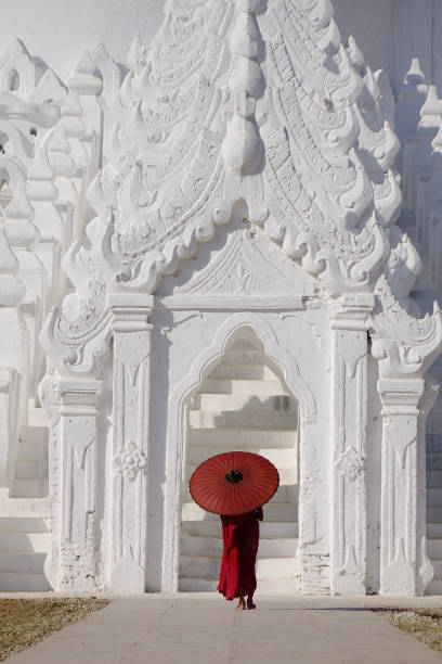 istock Buddhist novice at the White Temple in Myanmar 1521121236