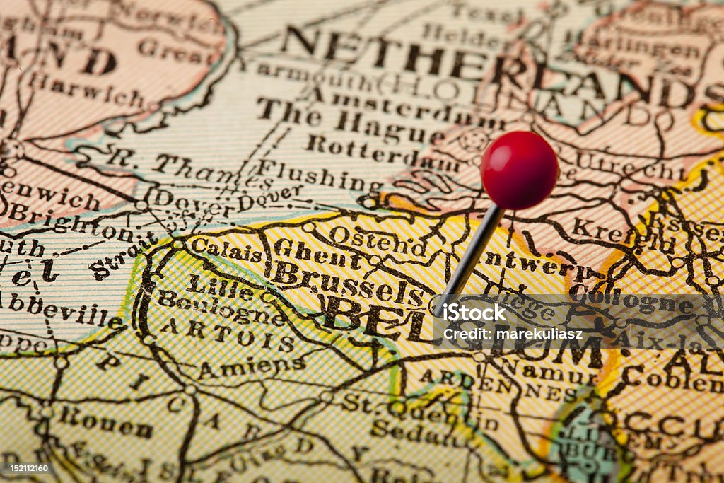 Belgium and Brussels Belgium and Brussels, European Union Center, on vintage 1920s map with a red pushpin, selective focus (printed in 1926 - expired copyrights) Belgium Stock Photo