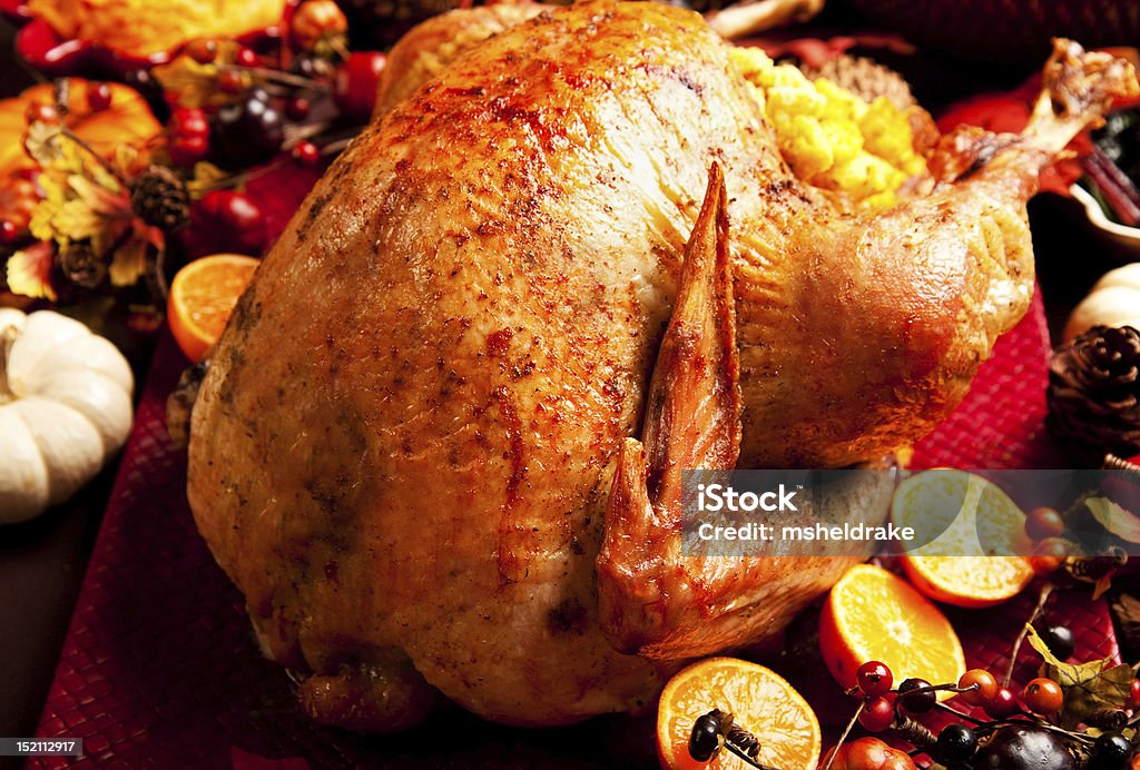 Roast turkey and trimmings for Thanksgiving celebration meal Thanksgiving Turkey in fall surroundings along with side dishes Thanksgiving - Holiday Stock Photo