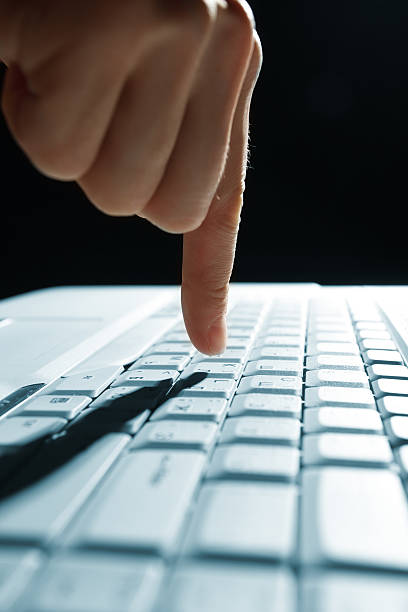 istock male hands typing on a laptop 152114267