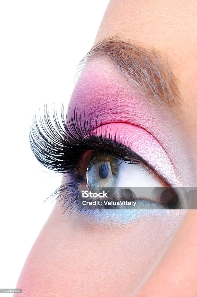 fashion makeup of a female eye Eye make-up with bright saturetad colors - macro shot Adult Stock Photo