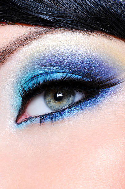 istock Woman wearing deep blue eyeshadow and long false eyelashes 152114435