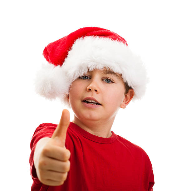 istock Christmas time - boy with Santa Clause hat 152115729