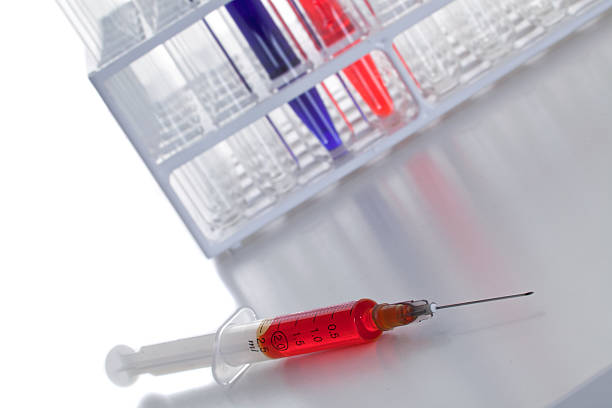 istock medical test tubes and syringe 152116005